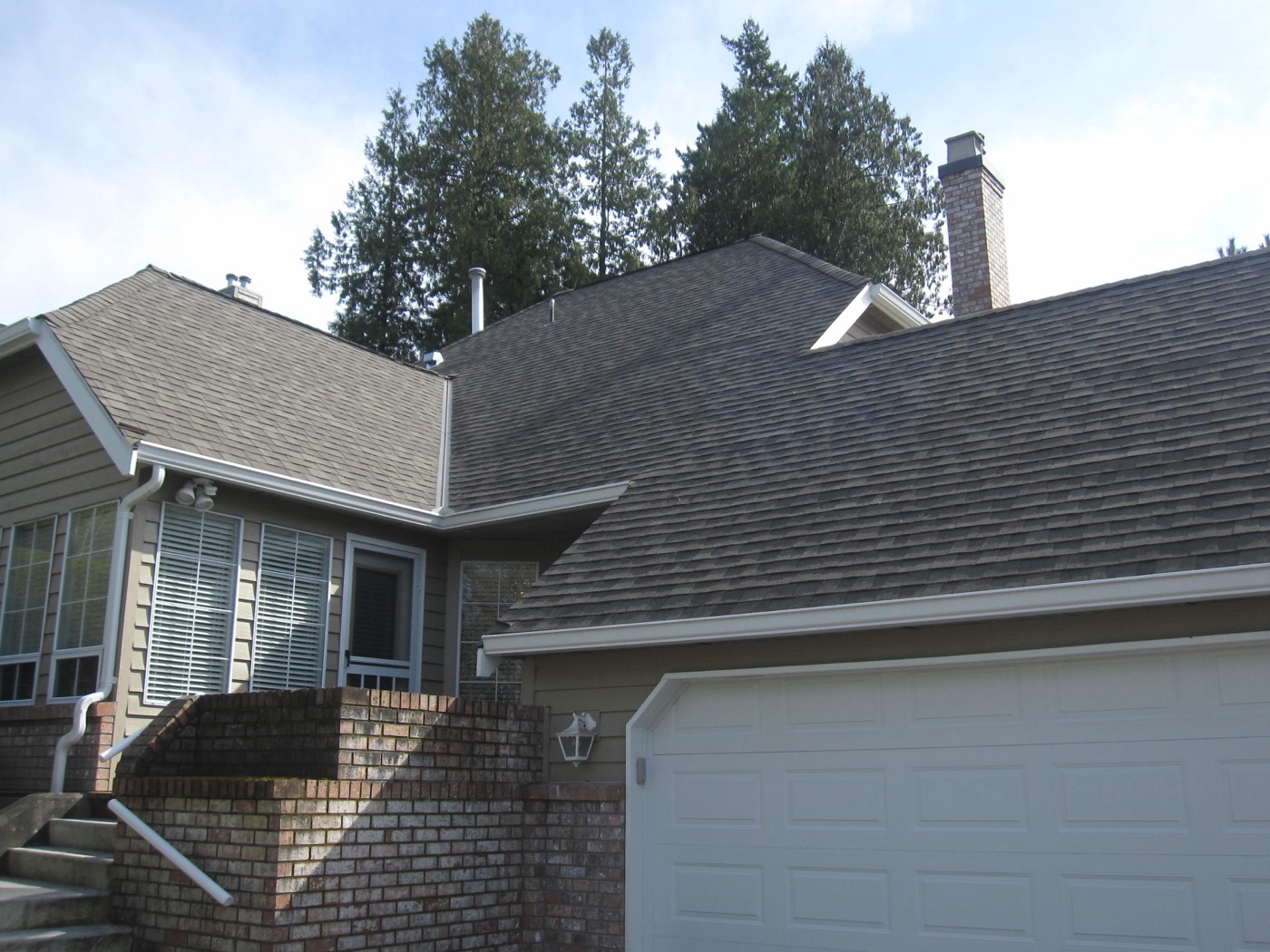 Home with a completed shingle roof